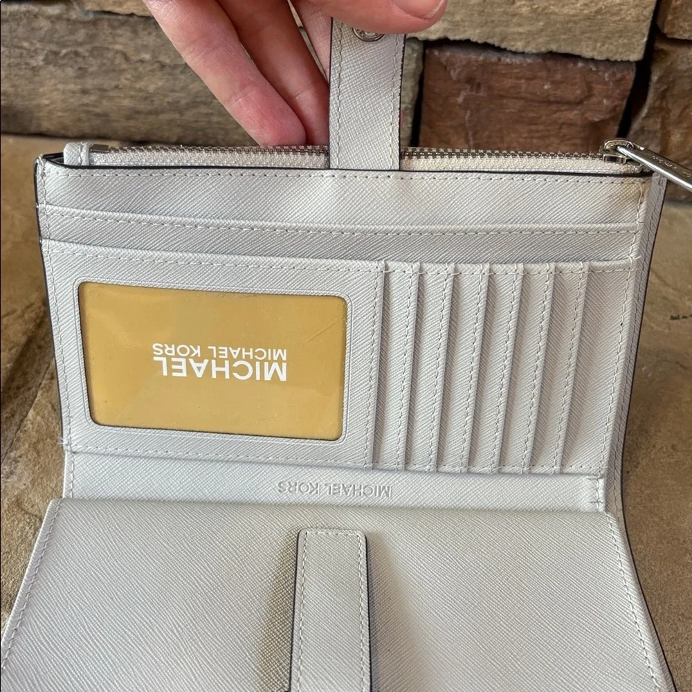 Michael Kors light grey wristlet/wallet